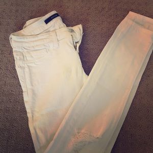 Distressed white DSTLD jeans